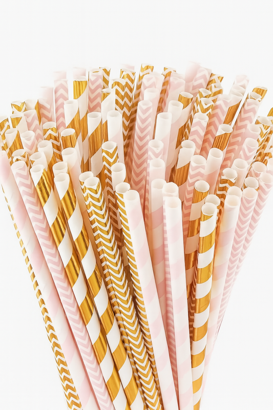 Set of colorful paper straws with patterns on a white background