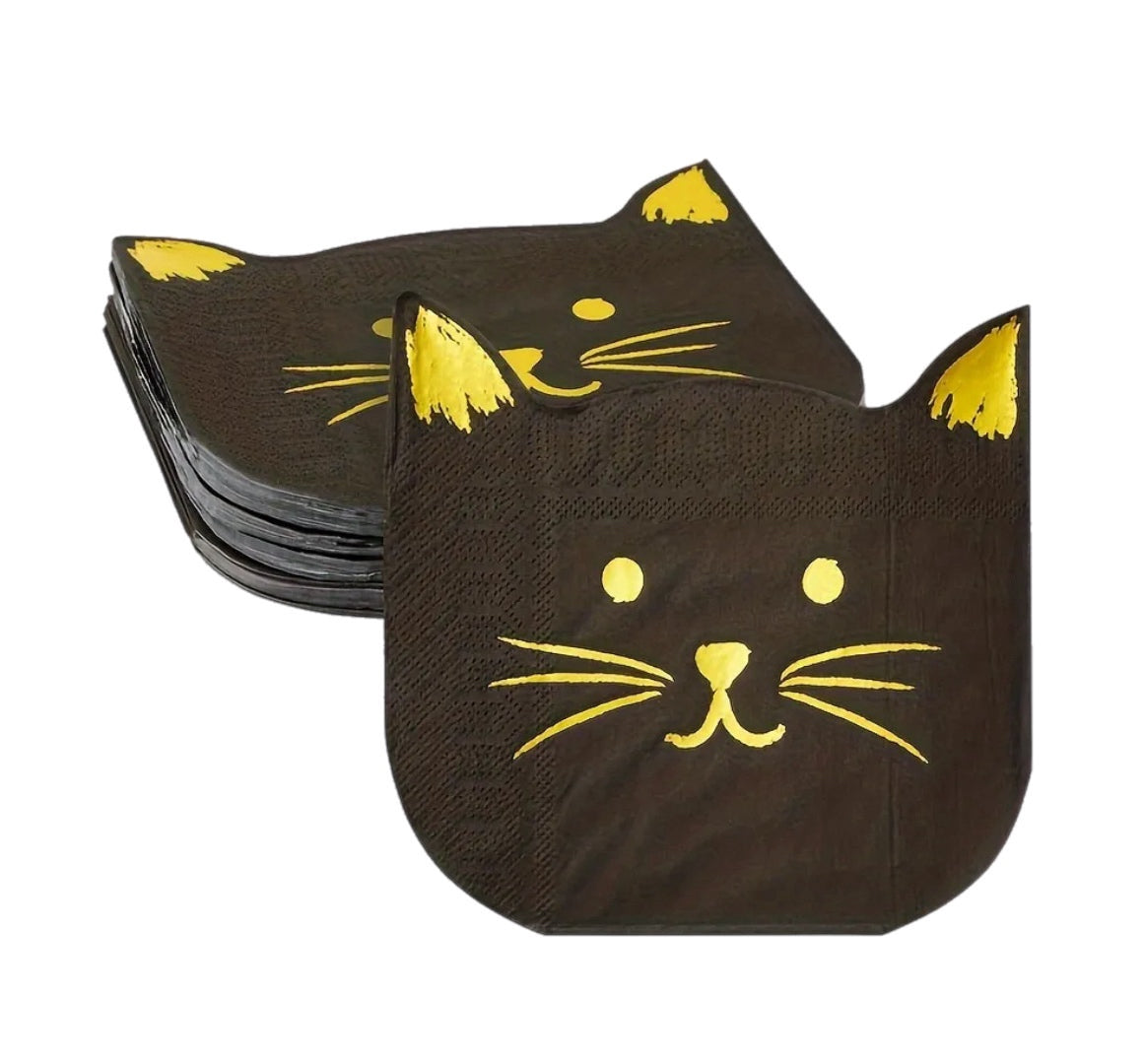 Cat-shaped napkins with yellow accents on a white background