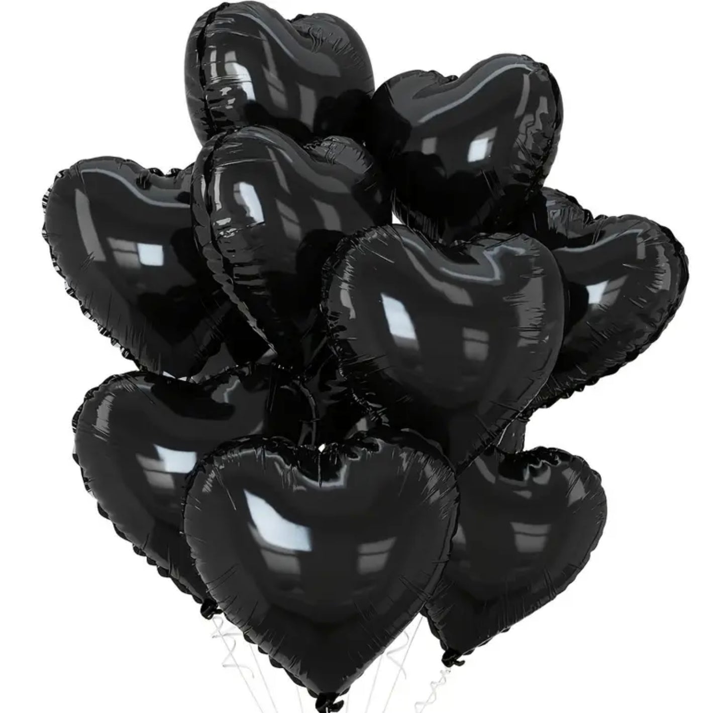Black heart-shaped balloons on a white background