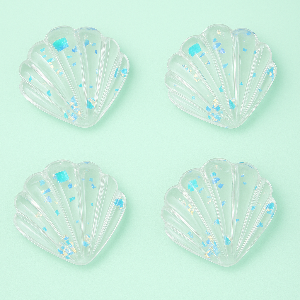 Clear shell shaped hair clips with confetti foil detail