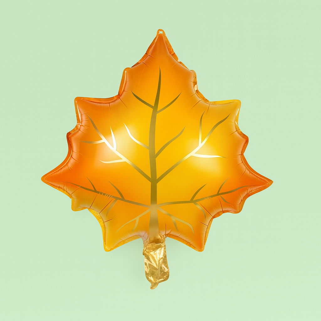 Leaf-shaped balloon with a gold and orange gradient on a light green background