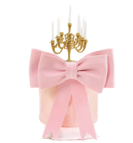 Oversized pink bow cake decoration