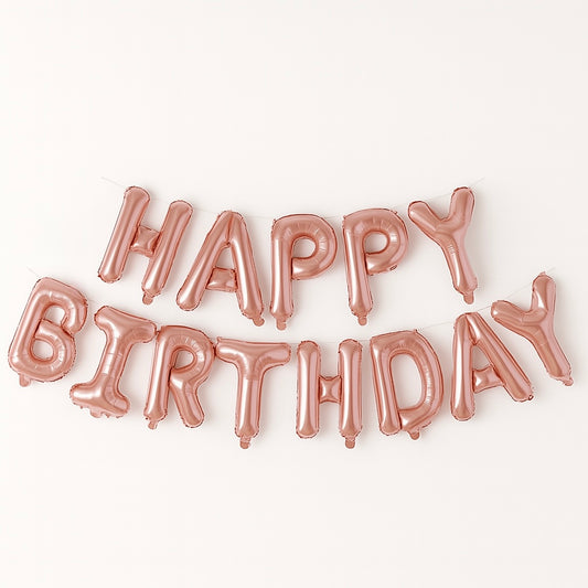 Rose gold 'Happy Birthday' balloon set on a white background