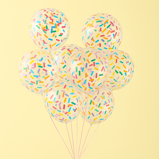 Transparent sprinkle filled party balloons