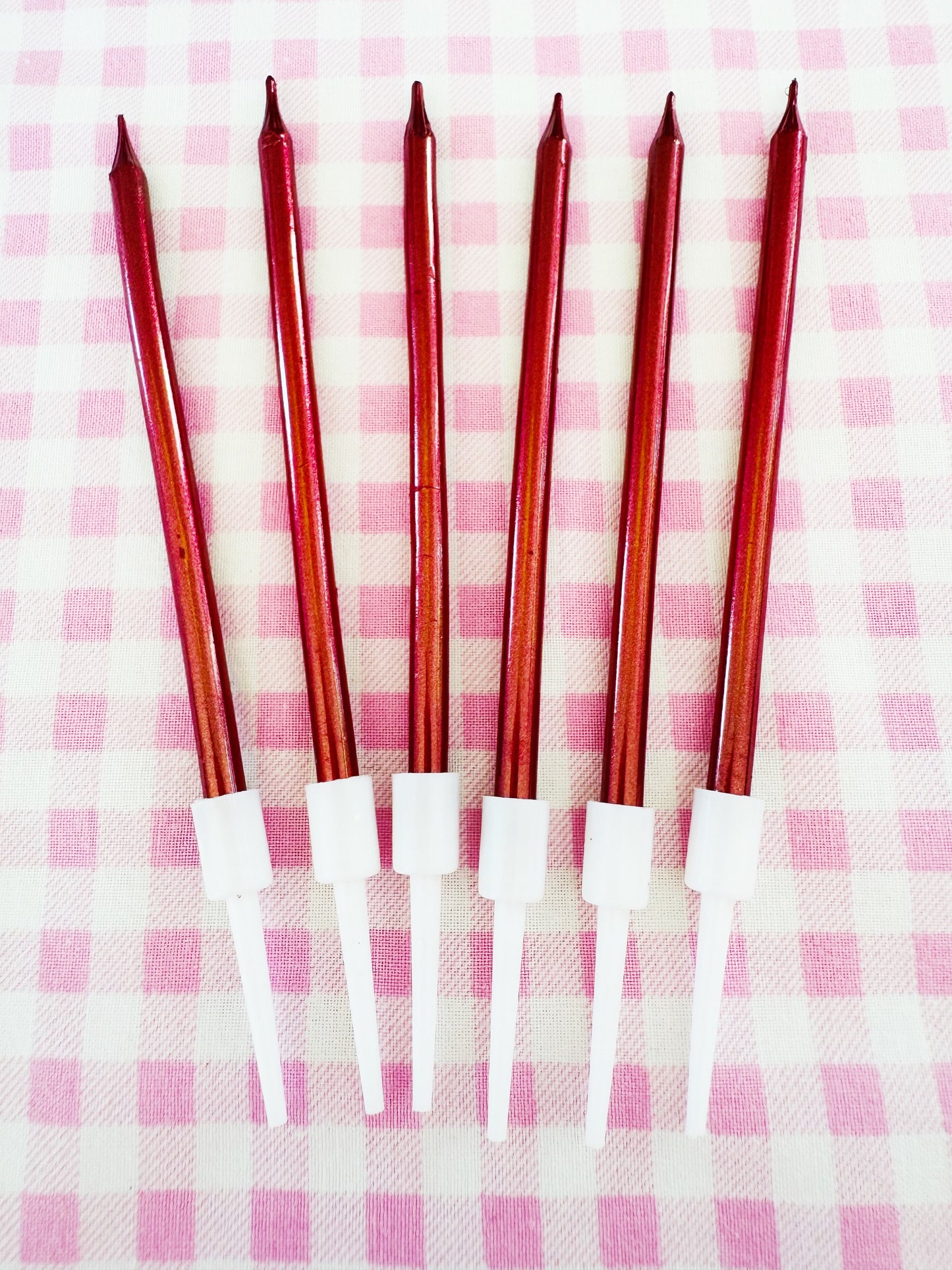 metallic red skinny pink coquette cake candles