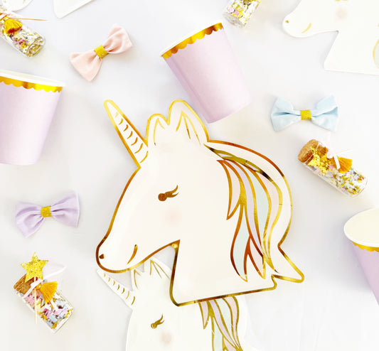 Unicorn pastel party tableware and confetti