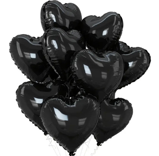 Black heart-shaped balloons on a white background