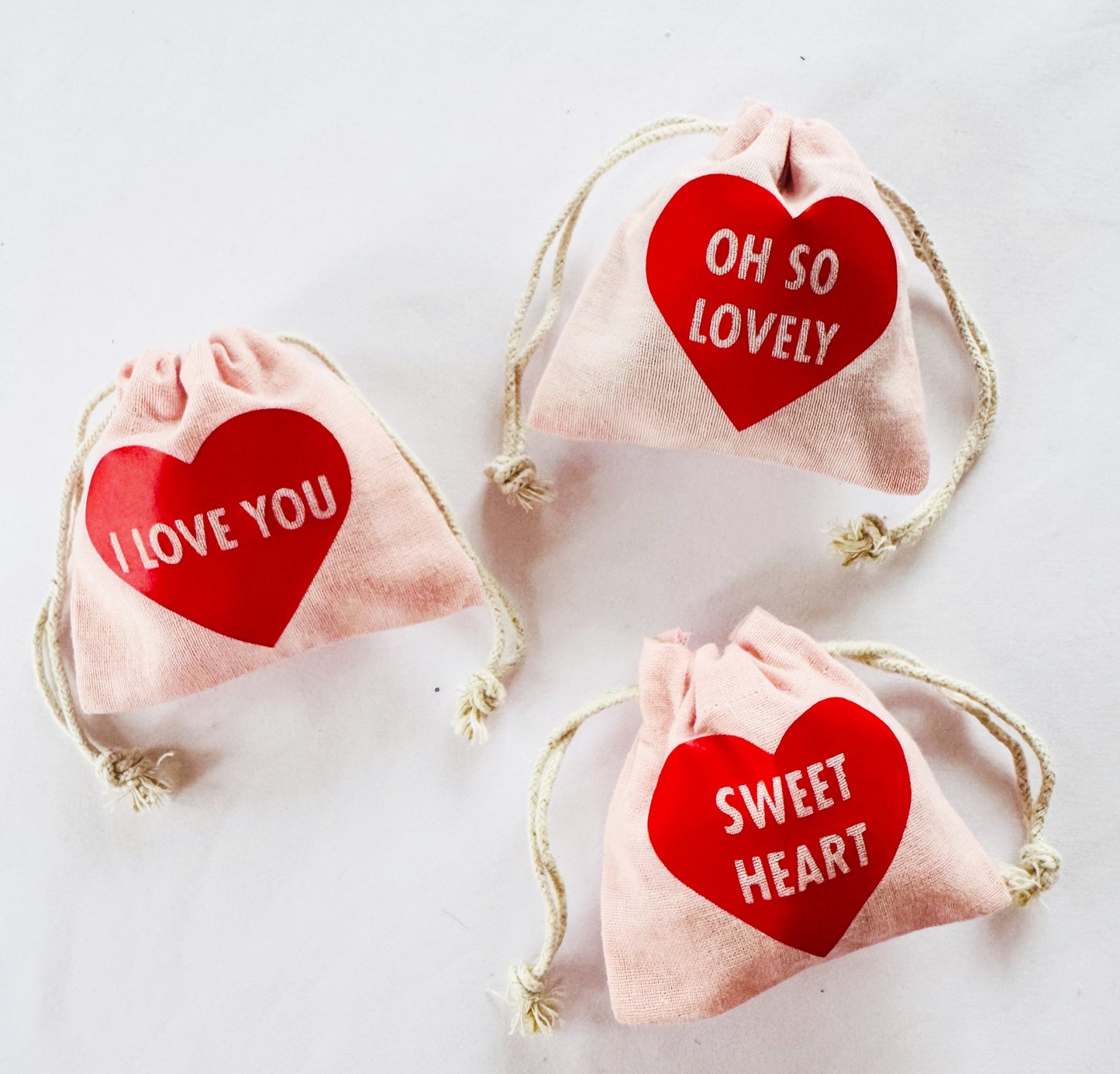 Mini pink and red heart motif gift bags