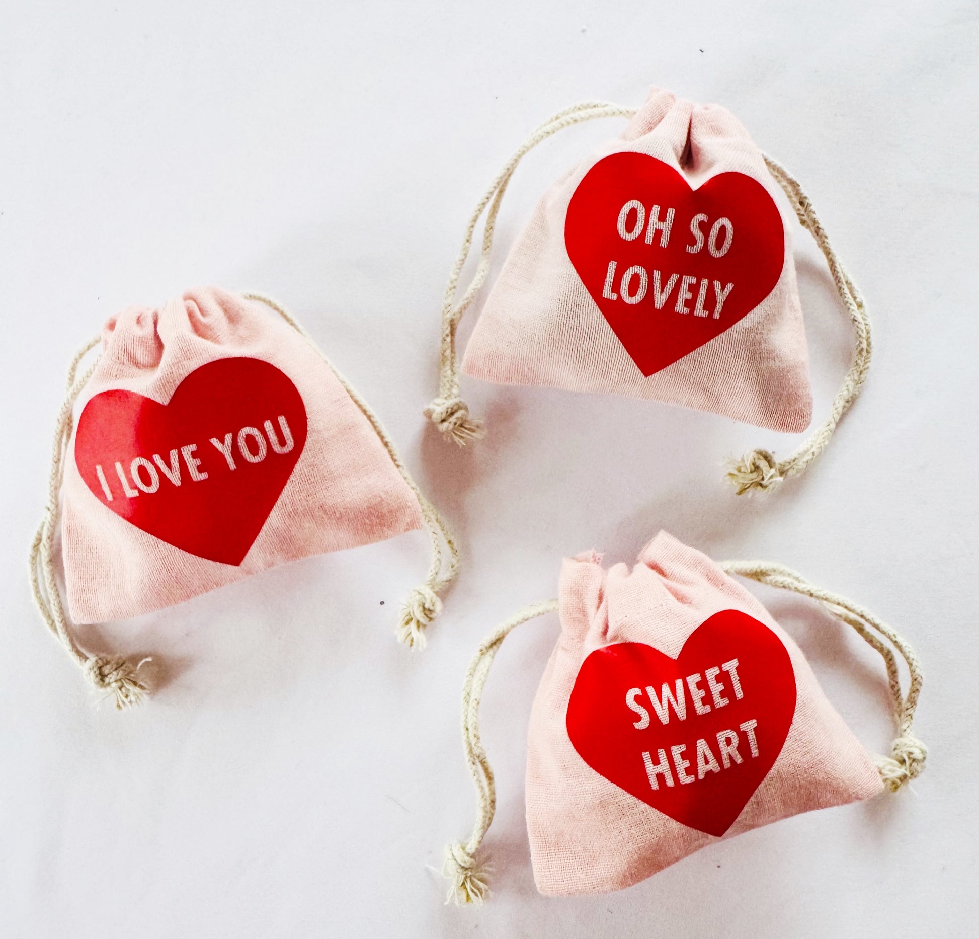 Mini pink and red heart motif gift bags