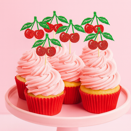 Glitter cherry cake toppers set on pink frosted cakes 