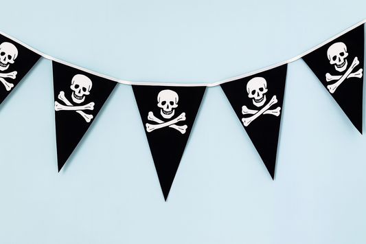 Pirate-themed banner with black triangles featuring white skull and crossbones design on a light blue background.