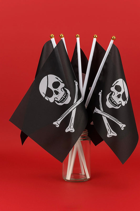 black pirate flags with skull and crossbones design on a red background