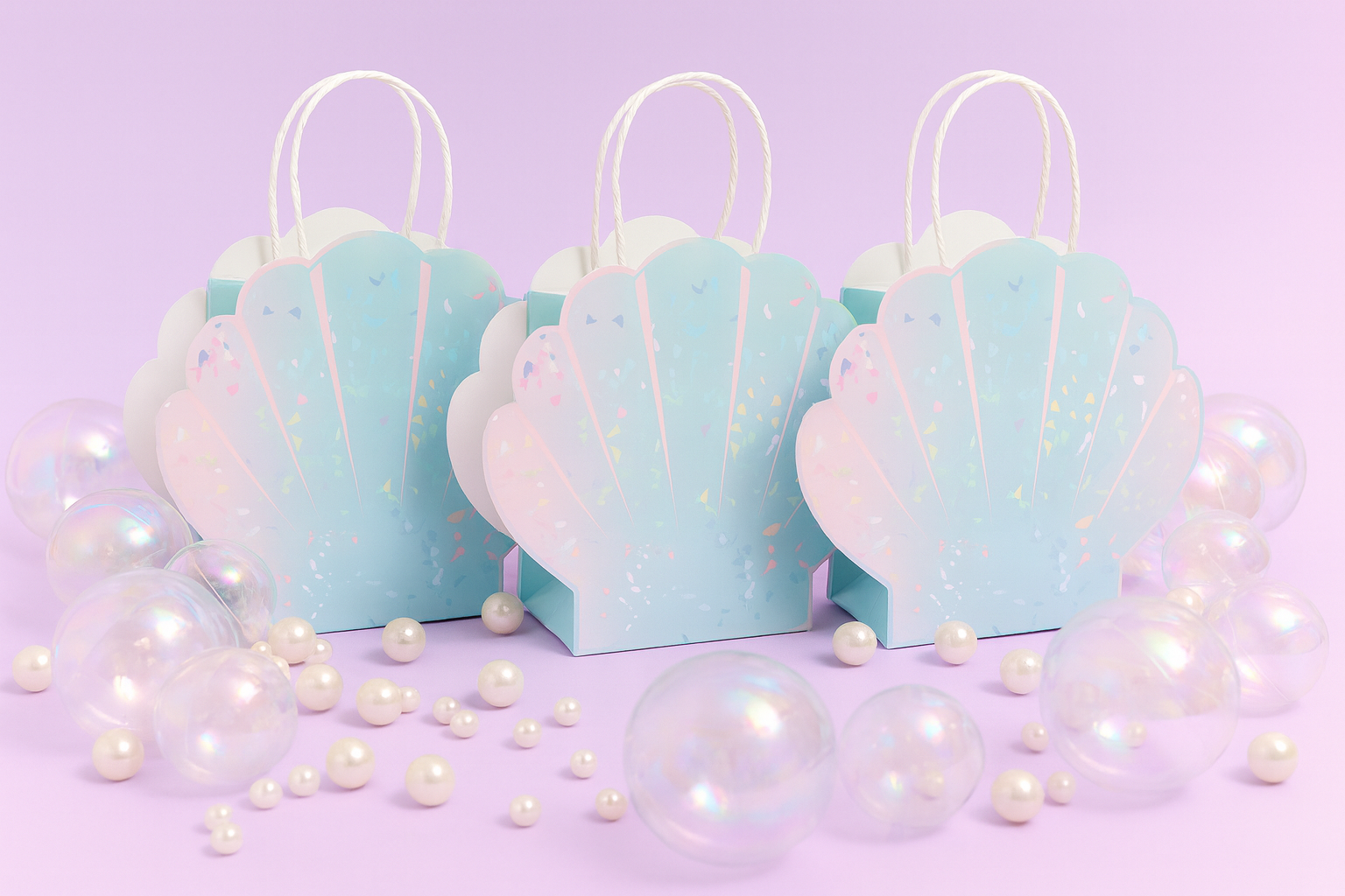 Three pastel blue gift bags shaped like seashells on a purple background with pearls.